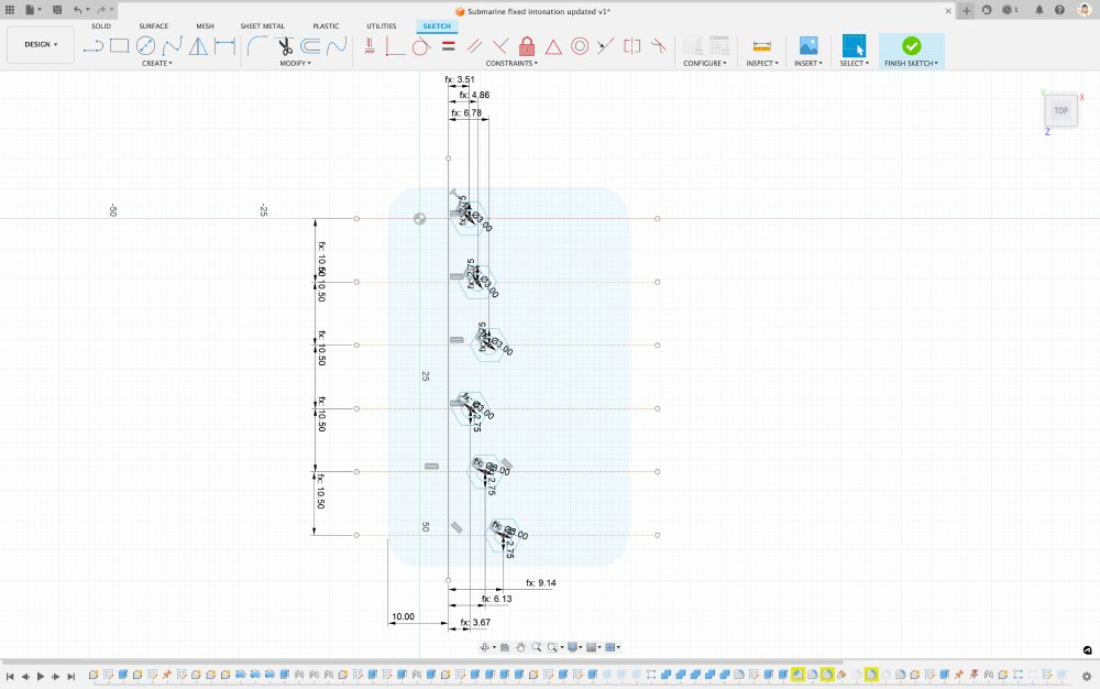 A photo of a CAD drawing of the bridge part, but now with lots of measurement numbers applied to it.