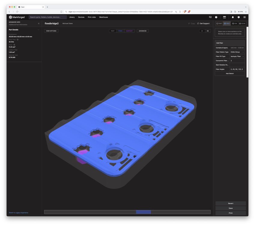 Another screenshot of the ghosted part in the Markforged slicer software, but now the carbon-fibre layer goes for most of the surface rather than being full of holes.