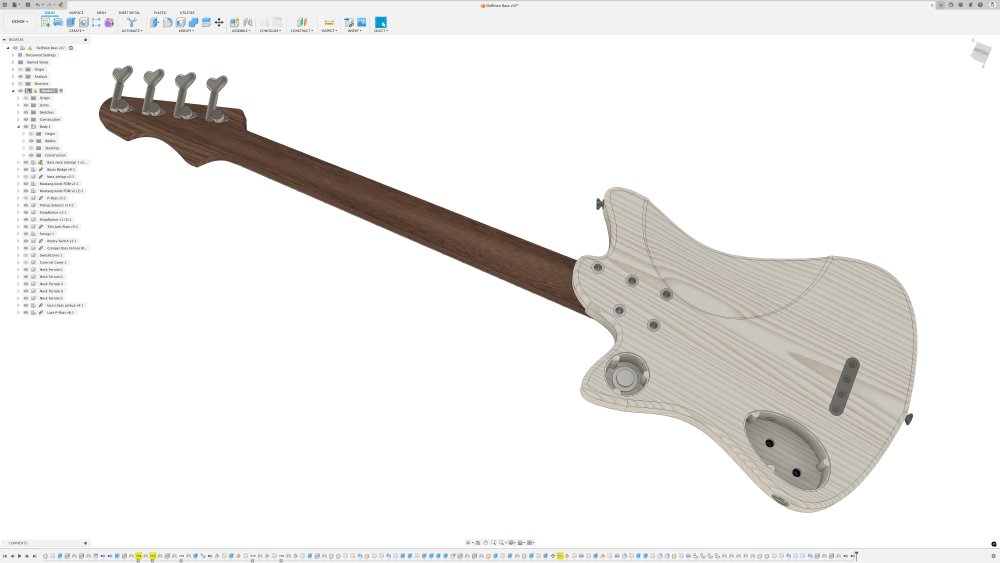 A screenshot of a CAD program showing the rear of a 3D-model an electric bass-guitar. Of particular note here is that there are no covers on the cavities in the back where the electronics will go. There is one round cavity towards the neck, and a larger oblong shaped cavity near the tail. In each you can see small posts along the sides to make space for screw mounts for the lids.