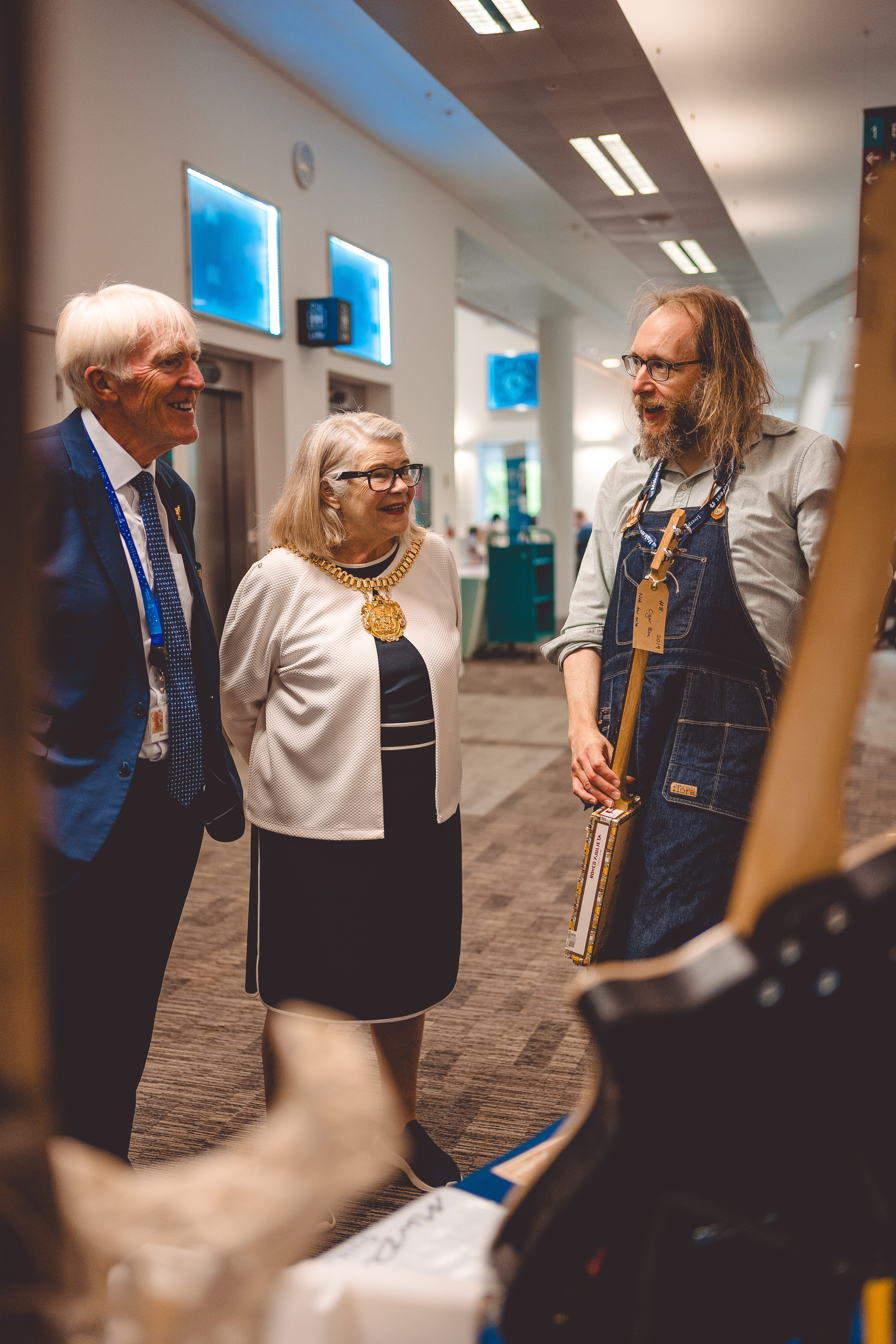A photo of me chatting to the Lord Major of Liverpool, who has a very large gold badge of office on her, and one of her colleages.