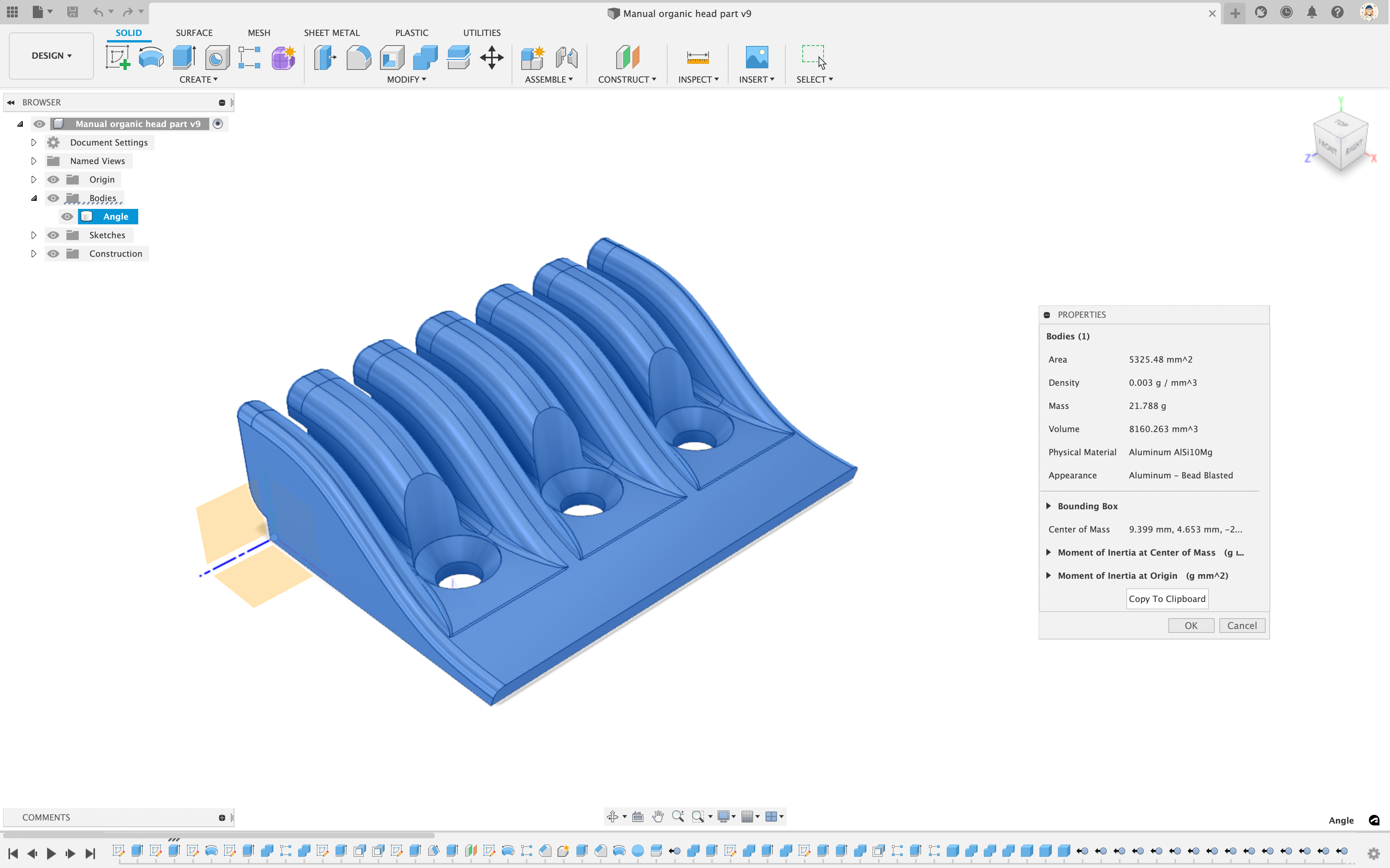 A screenshot of a CAD tool showing a part that acts as the headstock of the guitar. It's a swooping wedge shape with six channels cut in it (one per string) and three holes in it (for screws).